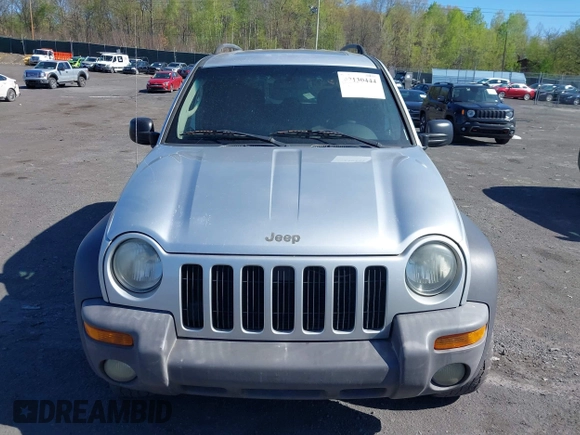 2004 Jeep Liberty Sport with VIN 1J4GL48K84W130852, listed as a IAAI auction lot 42130444 with 99,188 mi miles. Bid and sale history available at carsss.com. Image 6.