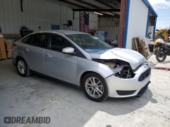 2017 Ford Focus SE with VIN 1FADP3F21HL258115, listed as a Copart auction lot 60151275 with 42,450 mi miles and Salvage title. Bid and sale history available at DreamBid. Image 4.