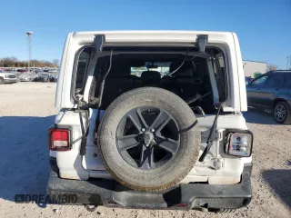 2019 Jeep Wrangler Unlimited Sahara with VIN 1C4HJXEGXKW651960, listed as a Copart auction lot 84255444 with 61,982 mi miles and Salvage title. Bid and sale history available at DreamBid. Image 6.