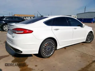 2017 Ford Fusion Titanium с VIN 3FA6P0K99HR118082, выставлен на аукционе Copart как лот 55459615 с пробегом 89 148 миль миль и Чистый • Clean title. История ставок и продаж доступна на DreamBid. Изображение 3.