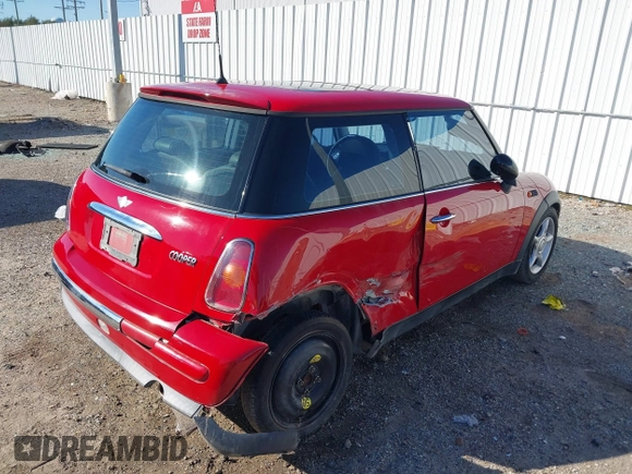 2003 MINI Hardtop with VIN WMWRC33413TC48601, listed as a IAAI auction lot 41418901 with 57,095 mi miles and . Bid and sale history available at DreamBid. Image 4.