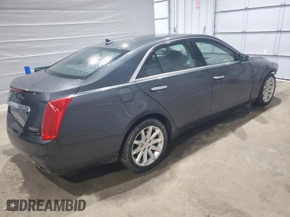 2014 Cadillac CTS Luxury AWD z VIN 1G6AX5SX5E0185132, wystawiony jako Copart lot #52292465 z przebiegiem 69 344 mil mil oraz Szkoda całkowita • Salvage title. Historia ofert i sprzedaży dostępna na DreamBid. Obrazek 3.