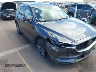 2021 Mazda CX-5 Touring with VIN JM3KFACM2M1348305, listed as a IAAI auction lot 41627199 with 30,044 mi miles. Bid and sale history available at carsss.com. Image 6.