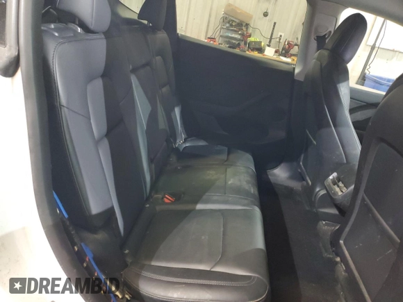 2023 Tesla Model Y Long Range z VIN 7SAYGDEE5PF619265, wystawiony jako Copart lot #48418655 z przebiegiem 42 233 mil mil oraz Szkoda całkowita • Salvage title. Historia ofert i sprzedaży dostępna na DreamBid. Obrazek 11.