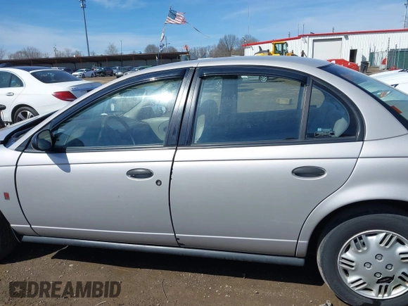 1999 Saturn SL z VIN 1G8ZH5281XZ376254, wystawiony jako IAAI lot #41857372 z przebiegiem 229 836 mil mil oraz . Historia ofert i sprzedaży dostępna na DreamBid. Obrazek 14.
