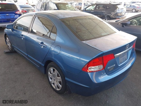 2010 Honda Civic Sdn LX with VIN 2HGFA1F50AH581076, listed as a IAAI auction lot 41945819 with 154,636 mi miles. Bid and sale history available at carsss.com. Image 3.