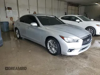 2020 Infiniti Q50 Pure with VIN JN1EV7AP5LM206636, listed as a Copart auction lot 54479215 with 79,174 mi miles and Salvage title. Bid and sale history available at DreamBid. Image 4.
