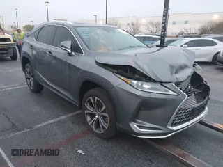 2022 Lexus RX with VIN 2T2HZMAA7NC245264, listed as a IAAI auction lot 41301838 with 36,266 mi miles. Bid and sale history available at carsss.com. Image 1.