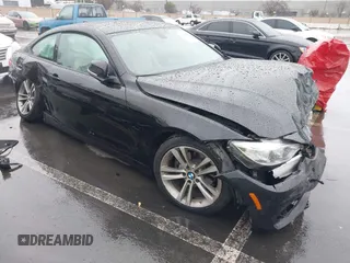 2015 BMW 4 Series 428i with VIN WBA3N7C57FK222351, listed as a IAAI auction lot 41490737 with 99,322 mi miles and . Bid and sale history available at carsss.com. Image 1.