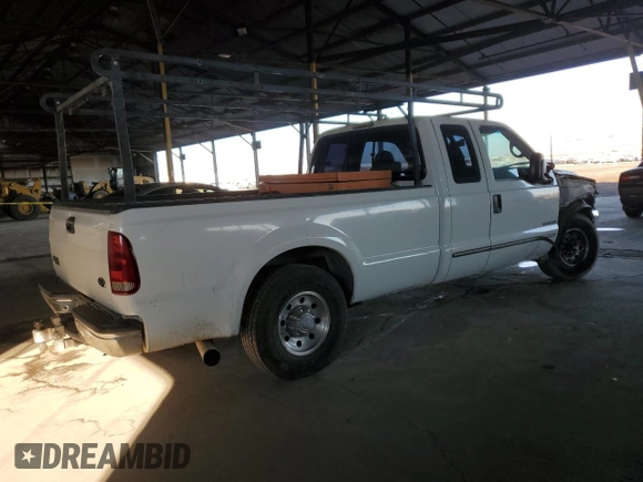 1999 Ford F-250 XL with VIN 1FTNX20FXXEE59499, listed as a Copart auction lot 87511735 with 215,520 mi miles and Salvage title. Bid and sale history available at DreamBid. Image 3.