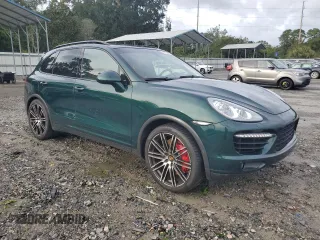 2012 Porsche Cayenne Turbo with VIN WP1AC2A25CLA80579, listed as a Copart auction lot 73360714 with 88,302 mi miles and Salvage title. Bid and sale history available at DreamBid. Image 4.