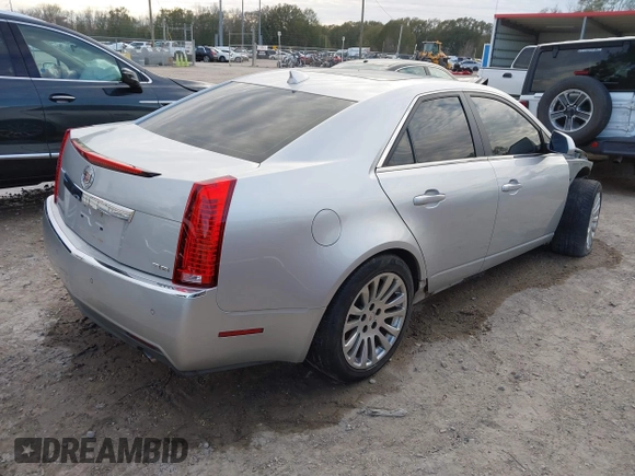2012 Cadillac CTS Premium with VIN 1G6DP5E34C0124972, listed as a IAAI auction lot 41245338 with 111,140 mi miles and . Bid and sale history available at DreamBid. Image 4.