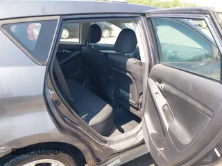2009 Pontiac Vibe with VIN 5Y2SM67009Z462332, listed as a IAAI auction lot 42620669 with 164,227 mi miles and . Bid and sale history available at DreamBid. Image 8.