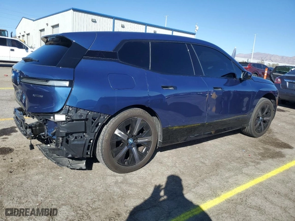 2024 BMW iX xDrive50 with VIN WB523CF05RCP88466, listed as a Copart auction lot 45592505 with 9,676 mi miles and Salvage Title. Bid and sale history available at carsss.com. Image 3.