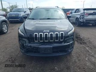 2014 Jeep Cherokee Latitude with VIN 1C4PJMCS0EW208092, listed as a IAAI auction lot 42174675 with 202,871 mi miles and . Bid and sale history available at carsss.com. Image 12.