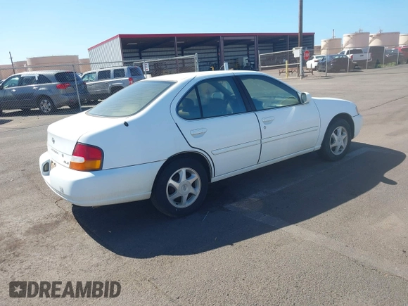 1999 Nissan Altima XE with VIN 1N4DL01D2XC125672, listed as a IAAI auction lot 41379153 with 183,685 mi miles. Bid and sale history available at carsss.com. Image 4.