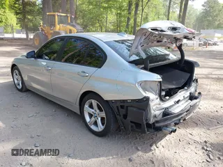 2015 BMW 3 Series 328i with VIN WBA3A5C55FF608033, listed as a IAAI auction lot 42144168 with 126,808 mi miles and . Bid and sale history available at DreamBid. Image 3.