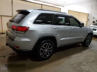 2017 Jeep Grand Cherokee Trailhawk with VIN 1C4RJFLG8HC618709, listed as a Copart auction lot 52899194 with 69,000 mi miles and Salvage title. Bid and sale history available at DreamBid. Image 3.