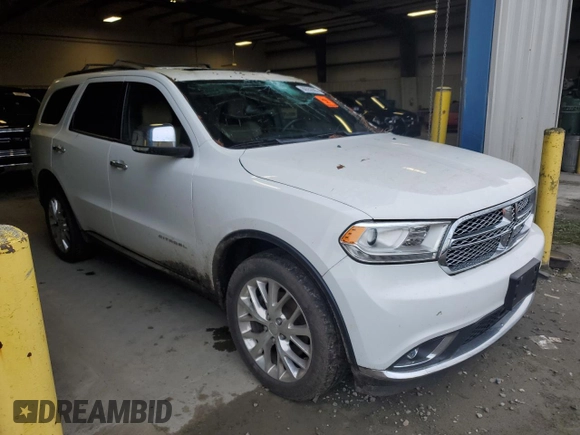2014 Dodge Durango Citadel with VIN 1C4SDJET7EC467069, listed as a Copart auction lot 88552685 with 161,105 mi miles and Salvage Title. Bid and sale history available at DreamBid. Image 4.