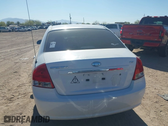 2009 Kia Spectra EX with VIN KNAFE222695588022, listed as a IAAI auction lot 42106609 with 153,688 mi miles. Bid and sale history available at carsss.com. Image 16.
