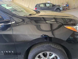 2020 Chevrolet Equinox LT z VIN 2GNAXJEV5L6233921, wystawiony jako IAAI lot #42466454 z przebiegiem 64 667 mil mil oraz . Historia ofert i sprzedaży dostępna na DreamBid. Obrazek 3.