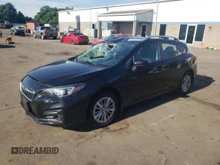 2018 Subaru Impreza Premium with VIN 4S3GTAB68J3739274, listed as a Copart auction lot 62193185 with 58,518 mi miles and Salvage title. Bid and sale history available at DreamBid. Image 1.