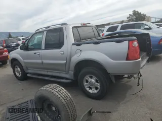 2003 Ford Explorer Sport Trac XLS with VIN 1FMZU67E33UA26245, listed as a Copart auction lot 47224405 with 113,009 mi miles and Salvage title. Bid and sale history available at DreamBid. Image 2.