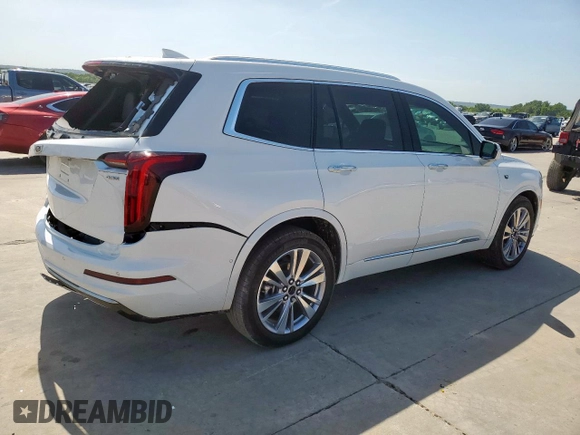 2024 Cadillac XT6 FWD Premium Luxury with VIN 1GYKPCRS7RZ711983, listed as a Copart auction lot 64842625 with 6,394 mi miles and Clean title. Bid and sale history available at DreamBid. Image 3.