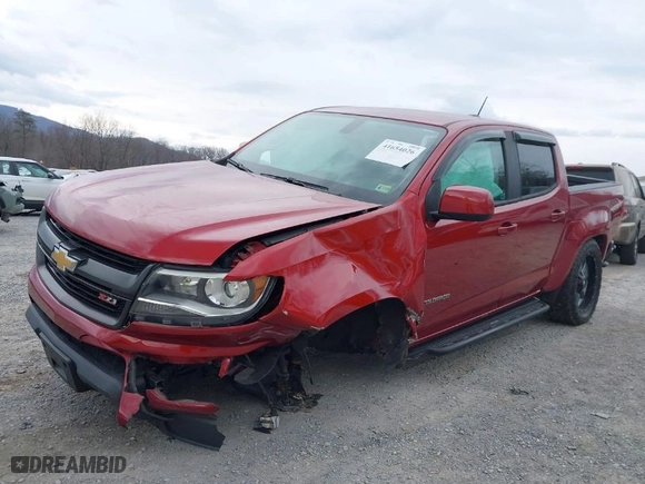2015 Chevrolet Colorado 4WD Z71 with VIN 1GCGTCE3XF1134799, listed as a IAAI auction lot 41654026 with 104,830 mi miles. Bid and sale history available at carsss.com. Image 6.