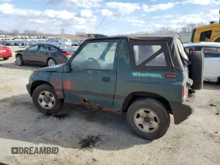 1996 Chevrolet Tracker z VIN 2CNBJ1863T6925397, wystawiony jako Copart lot #50446605 z przebiegiem 139 484 mil mil oraz Czysty tytuł • Clean title. Historia ofert i sprzedaży dostępna na DreamBid. Obrazek 2.