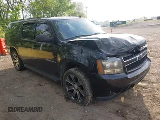 2007 Chevrolet Suburban LT z VIN 1GNFK16317J312027, wystawiony jako IAAI lot #42214940 z przebiegiem 305 088 mil mil oraz . Historia ofert i sprzedaży dostępna na DreamBid. Obrazek 1.
