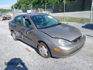 2003 Ford Focus LX with VIN 1FAFP33P63W324786, listed as a IAAI auction lot 42693187 with 128,597 mi miles and . Bid and sale history available at DreamBid. Image 1.