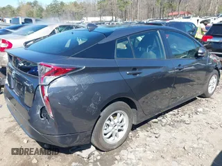 2017 Toyota Prius Two with VIN JTDKBRFU4H3036656, listed as a IAAI auction lot 41823354 with 59,233 mi miles and . Bid and sale history available at carsss.com. Image 4.