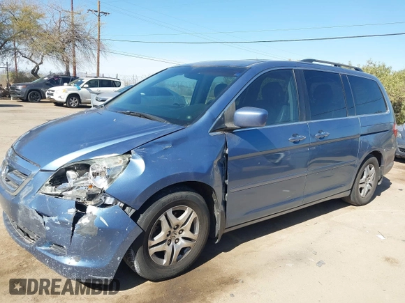 2006 Honda Odyssey EX-L with VIN 5FNRL38796B099851, listed as a IAAI auction lot 41555109 with 154,707 mi miles and . Bid and sale history available at DreamBid. Image 6.
