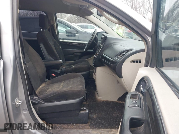 2014 Dodge Grand Caravan American Value with VIN 2C4RDGBG9ER187198, listed as a IAAI auction lot 41669334 with 204,803 mi miles and . Bid and sale history available at DreamBid. Image 5.