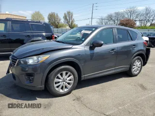 2016 Mazda CX-5 Touring with VIN JM3KE2CY2G0612029, listed as a Copart auction lot 53810155 with 159,915 mi miles and Salvage Title. Bid and sale history available at carsss.com. Image 1.