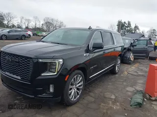2021 GMC Yukon XL Denali with VIN 1GKS2JKL1MR257867, listed as a IAAI auction lot 41510299 with 62,443 mi miles. Bid and sale history available at carsss.com. Image 20.