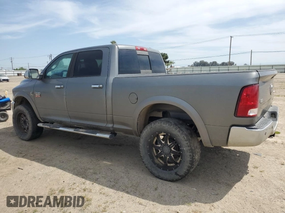 2012 Ram 2500 Laramie with VIN 3C6UD5FL4CG250594, listed as a Copart auction lot 52042365 with 233,777 mi miles and Salvage Title. Bid and sale history available at carsss.com. Image 2.