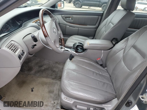 2003 Toyota Avalon XL with VIN 4T1BF28B63U300269, listed as a Copart auction lot 49210865 with 318,479 mi miles and Salvage Title. Bid and sale history available at carsss.com. Image 7.
