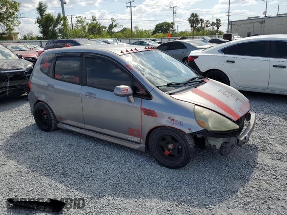 2007 Honda Fit Sport with VIN JHMGD38657S049544, listed as a Copart auction lot 50699175 with 188,830 mi miles and Salvage Title. Bid and sale history available at carsss.com. Image 4.