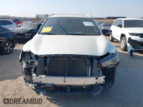 2020 Infiniti QX60 Luxe z VIN 5N1DL0MN7LC525683, wystawiony jako IAAI lot #42022763 z przebiegiem 70 575 mil mil oraz . Historia ofert i sprzedaży dostępna na DreamBid. Obrazek 12.