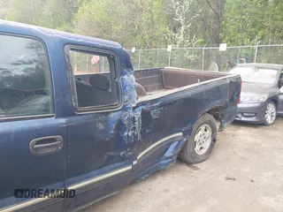 2001 Chevrolet Silverado 1500 LS with VIN 1GCEC19V21E132473, listed as a IAAI auction lot 42074952 with 107,128 mi miles and . Bid and sale history available at DreamBid. Image 6.