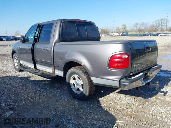2003 Ford F-150 XLT with VIN 1FTRW07L13KB66977, listed as a IAAI auction lot 41967541 with 124,714 mi miles. Bid and sale history available at carsss.com. Image 3.