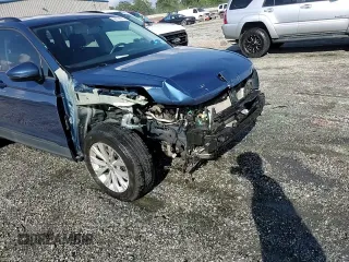 2018 Volkswagen Tiguan S with VIN 3VV0B7AX2JM019924, listed as a Copart auction lot 56138375 with 76,798 mi miles and Salvage title. Bid and sale history available at DreamBid. Image 14.