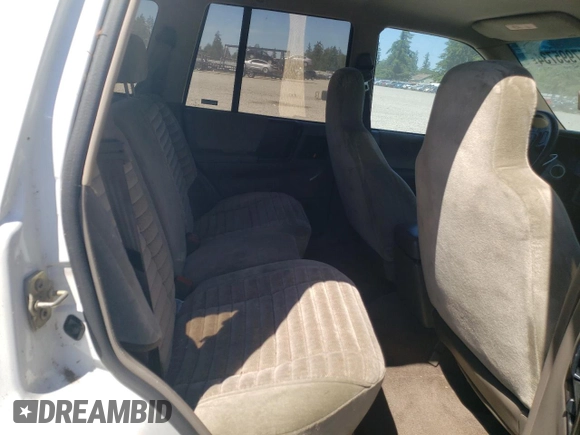 1994 Jeep Grand Cherokee Laredo with VIN 1J4GZ58Y7RC113333, listed as a Copart auction lot 57995734 with 220,950 mi miles and Clean Title. Bid and sale history available at carsss.com. Image 11.