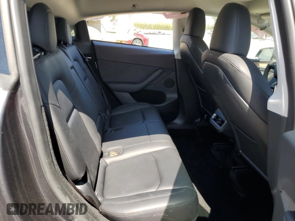 2024 Tesla Model Y Long Range with VIN 7SAYGDEE4RF990274, listed as a Copart auction lot 54239025 with 8,726 mi miles and Salvage title. Bid and sale history available at DreamBid. Image 10.
