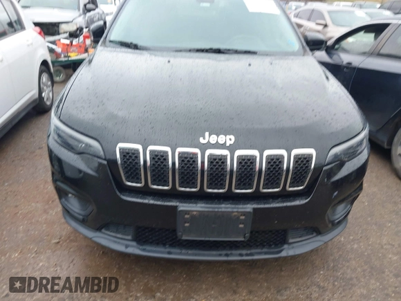 2019 Jeep Cherokee Latitude with VIN 1C4PJLCB4KD220229, listed as a IAAI auction lot 41179101 with 63,099 mi miles and . Bid and sale history available at DreamBid. Image 12.
