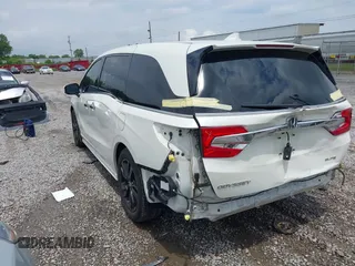 2019 Honda Odyssey Elite z VIN 5FNRL6H95KB104816, wystawiony jako IAAI lot #42232490 z przebiegiem 77 465 mil mil oraz . Historia ofert i sprzedaży dostępna na DreamBid. Obrazek 3.