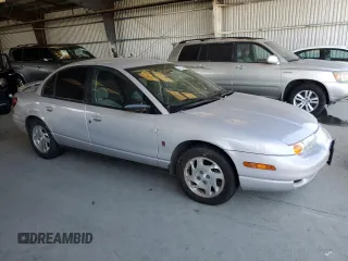 2000 Saturn SL with VIN 1G8ZK5275YZ269895, listed as a Copart auction lot 63102485 with Not provided miles and Clean title. Bid and sale history available at DreamBid. Image 4.