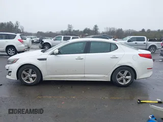 2015 Kia Optima LX with VIN KNAGM4A70F5571034, listed as a IAAI auction lot 41734211 with 214,948 mi miles. Bid and sale history available at carsss.com. Image 15.